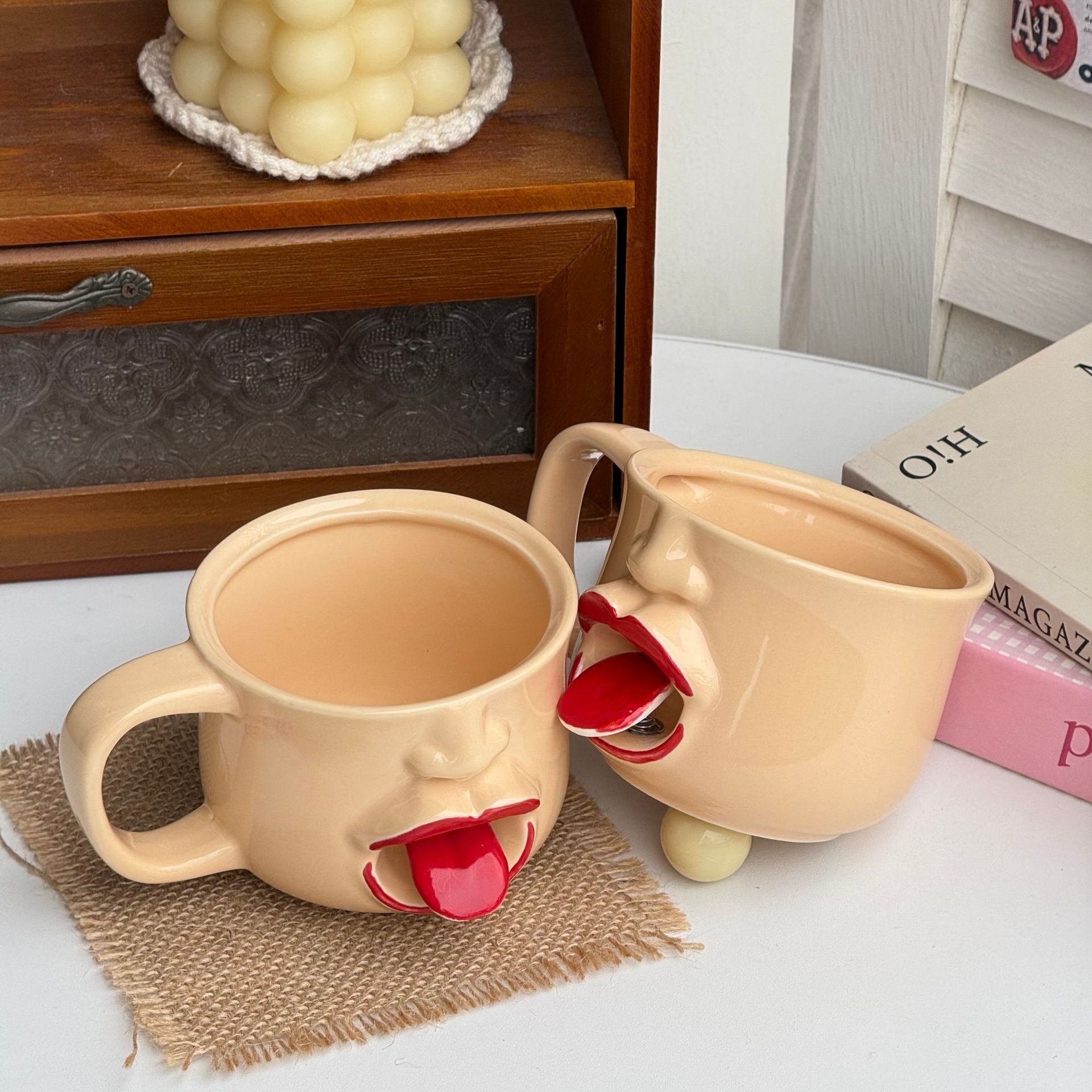 Handmade Ceramic Face Mug with Moving Tongue