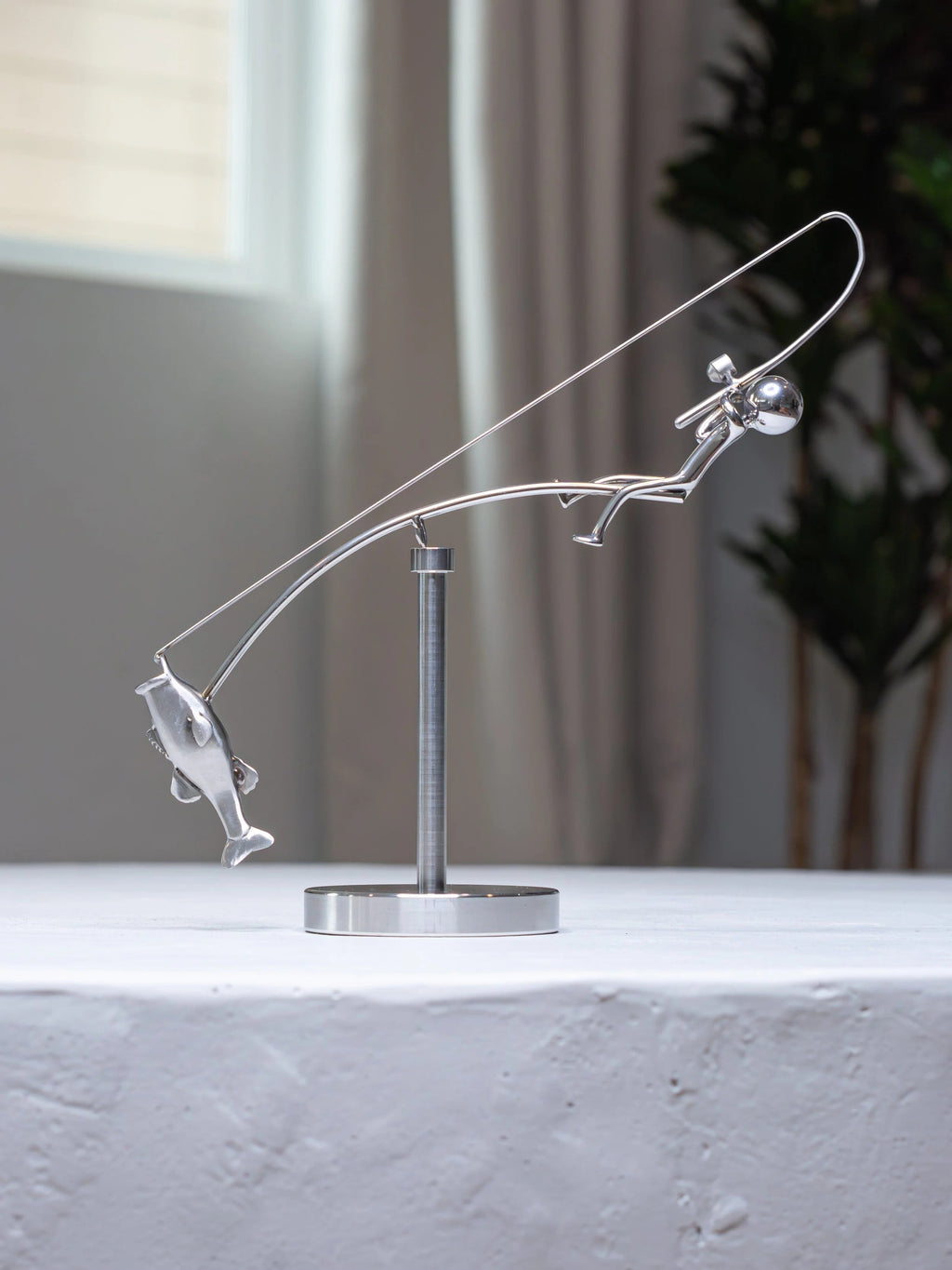 Stainless steel fishing rod and perch balance sculpture