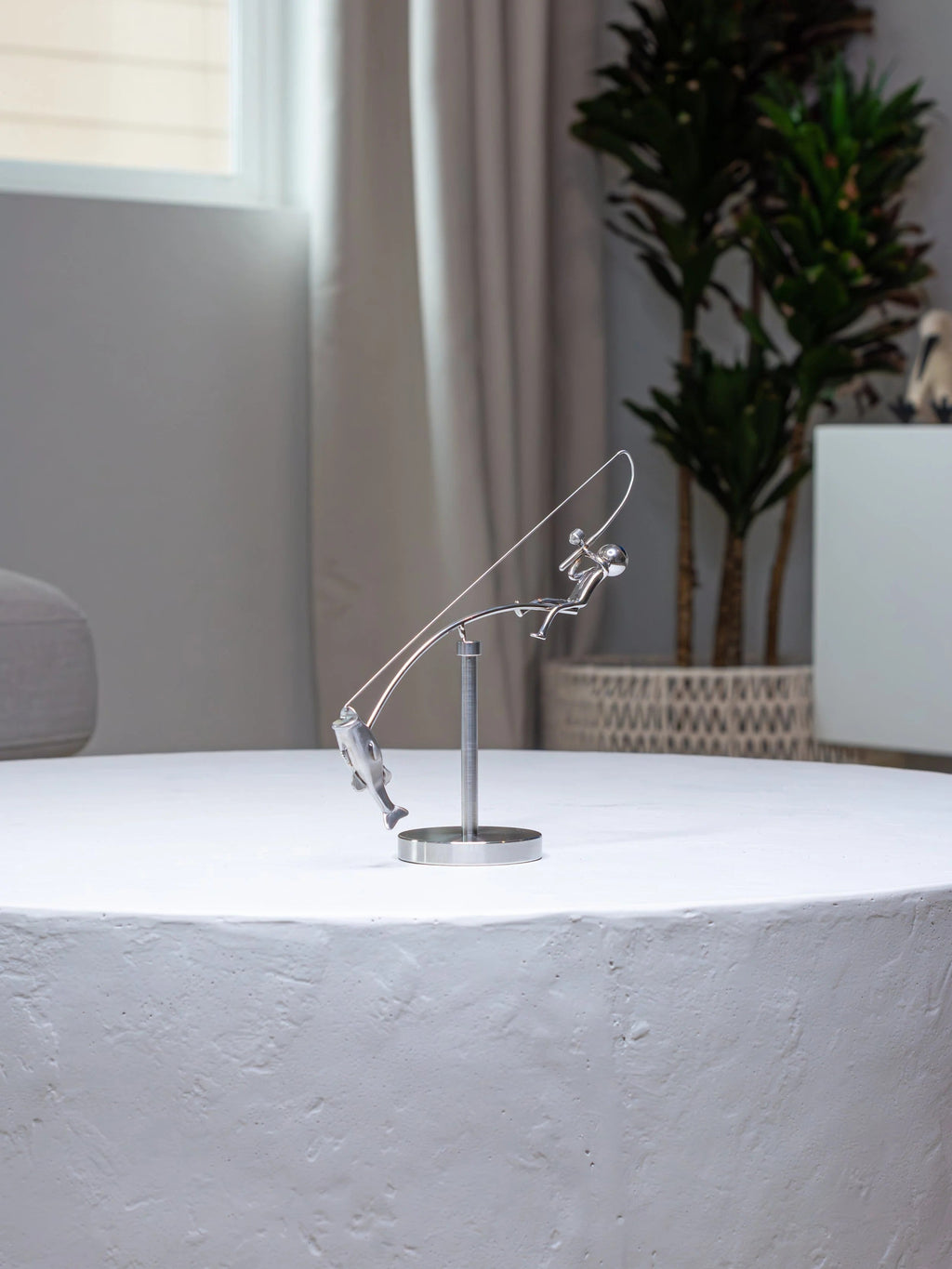 Stainless steel fishing rod and perch balance sculpture