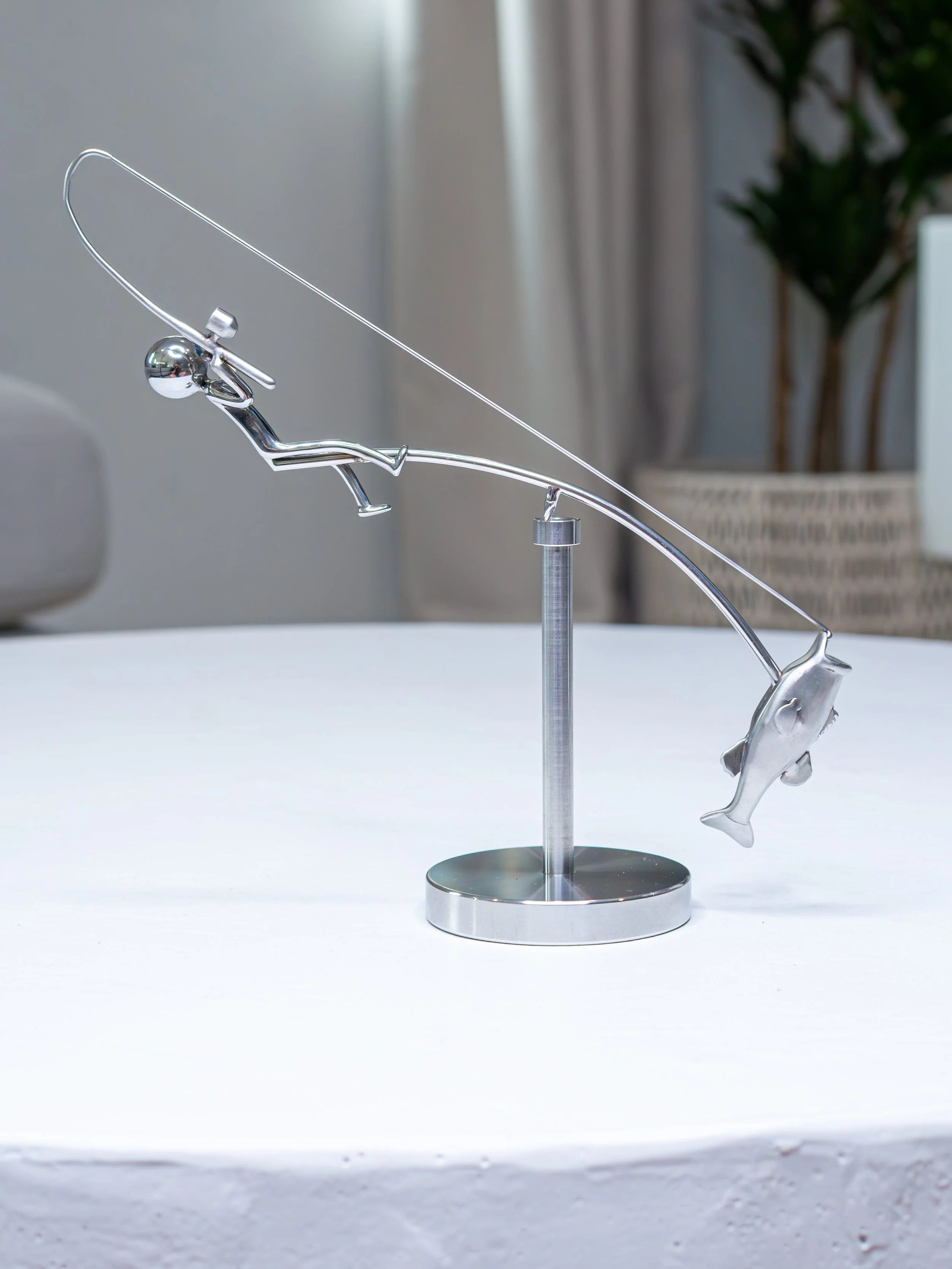Stainless steel fishing rod and perch balance sculpture