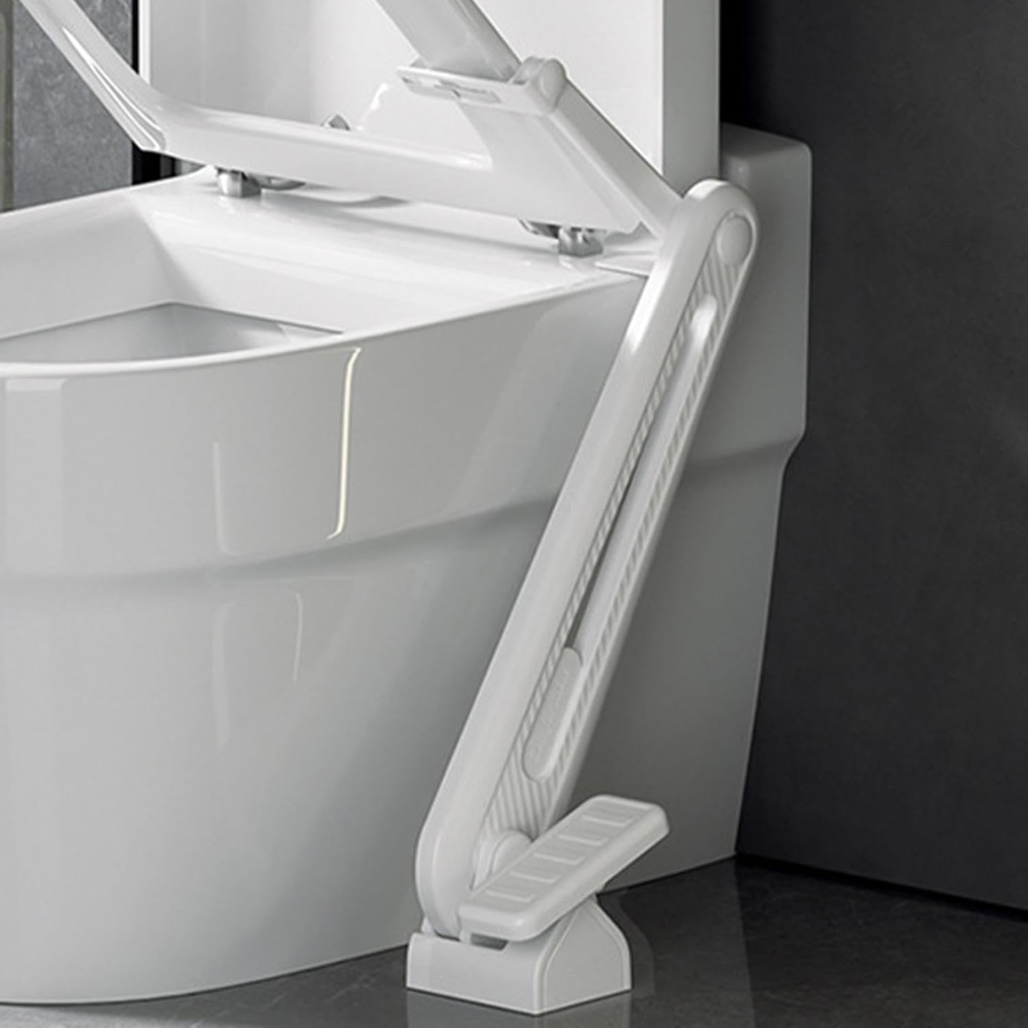Foot-operated toilet seat lifter