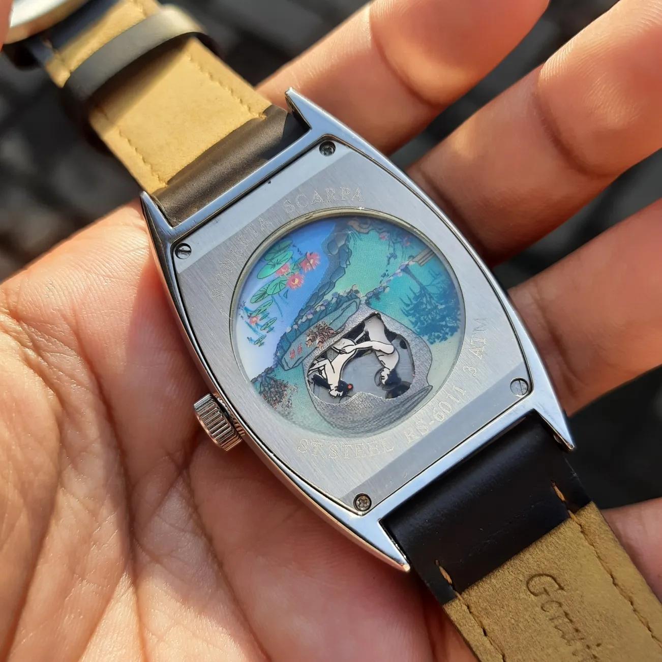 Open-back "erotic back cover" watch