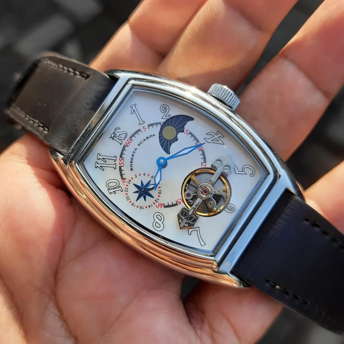 Open-back "erotic back cover" watch