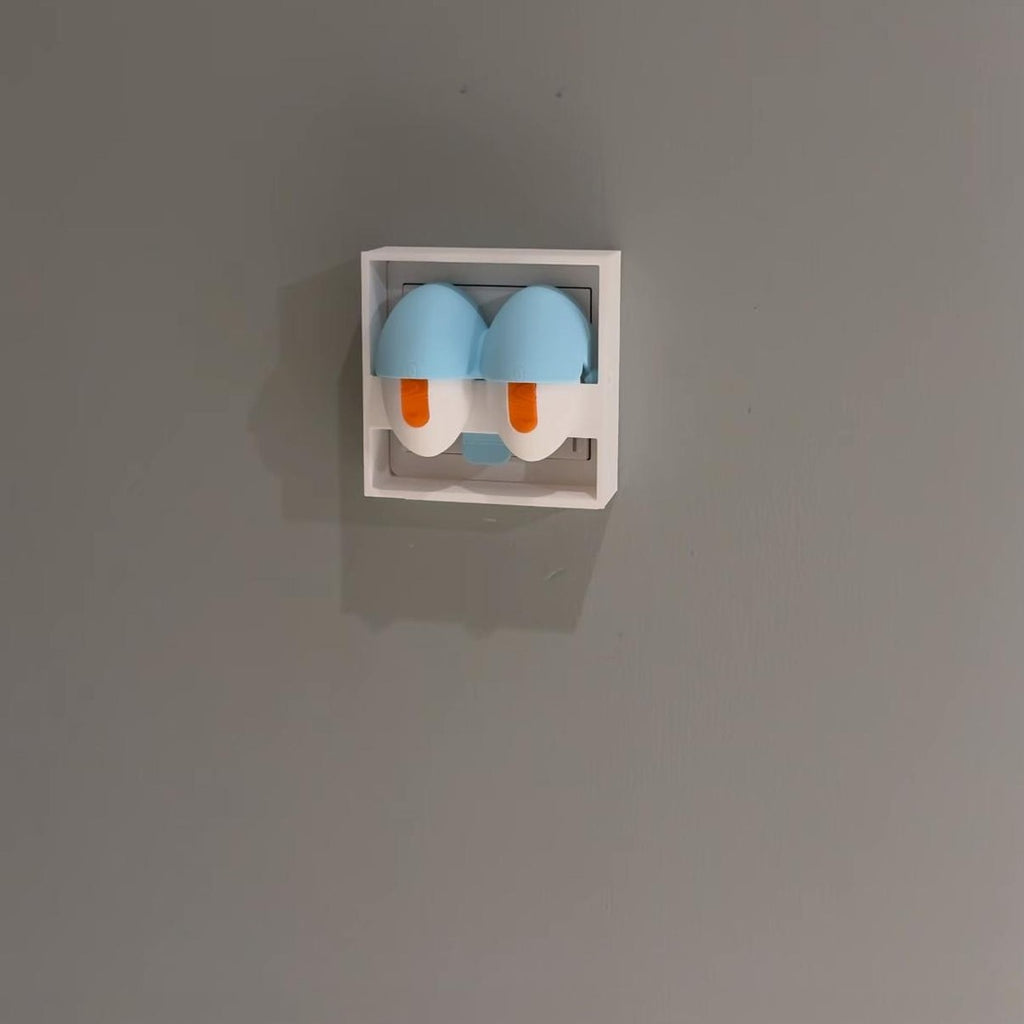 3D-printed Squidward "eyes open/closed" switch panel