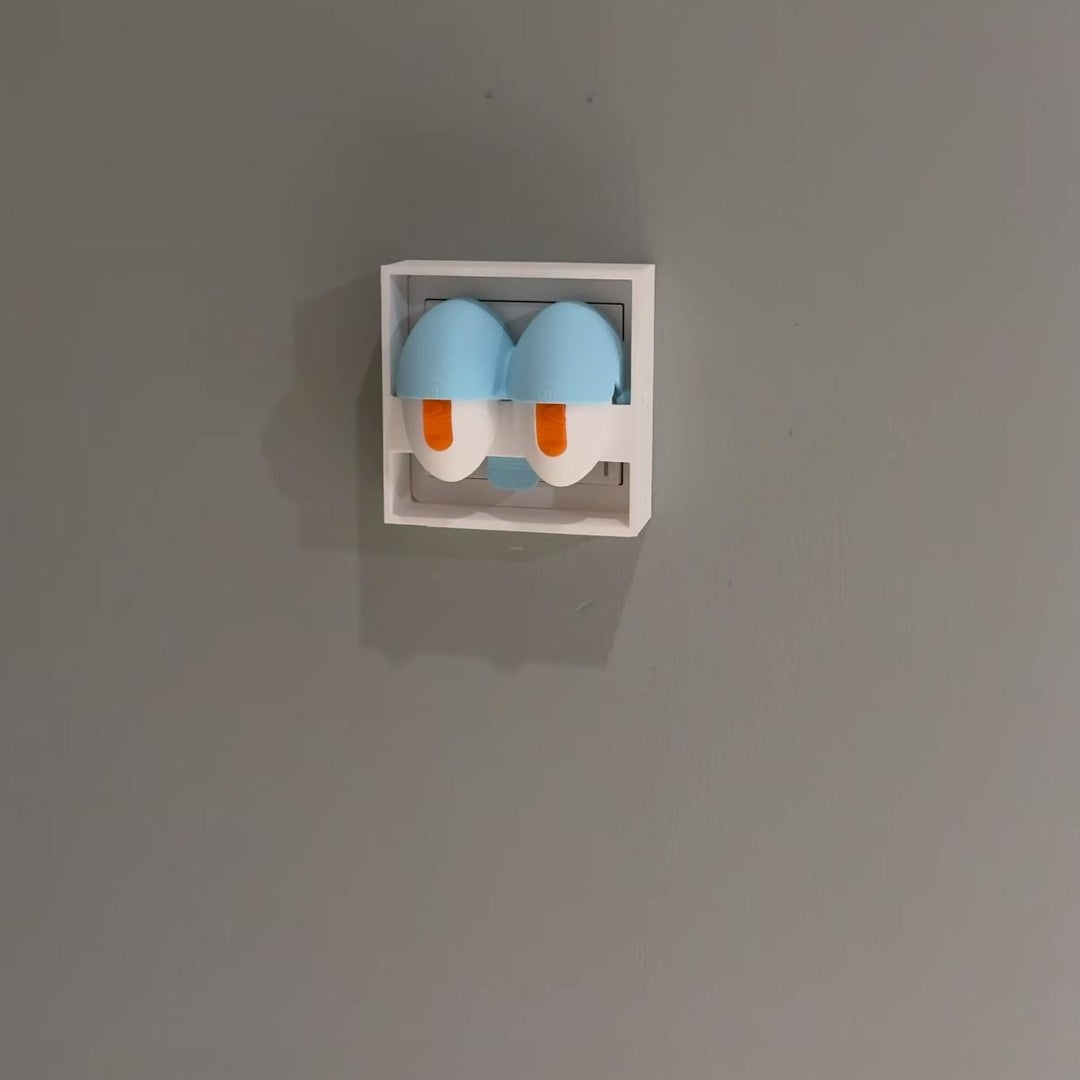 3D-printed Squidward "eyes open/closed" switch panel