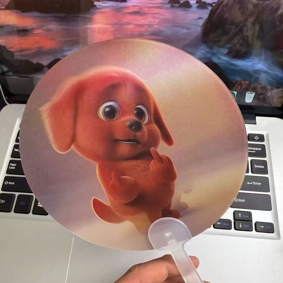 Red puppy emoji fan with cartoon transformation, funny and prank hand-cranked fan.